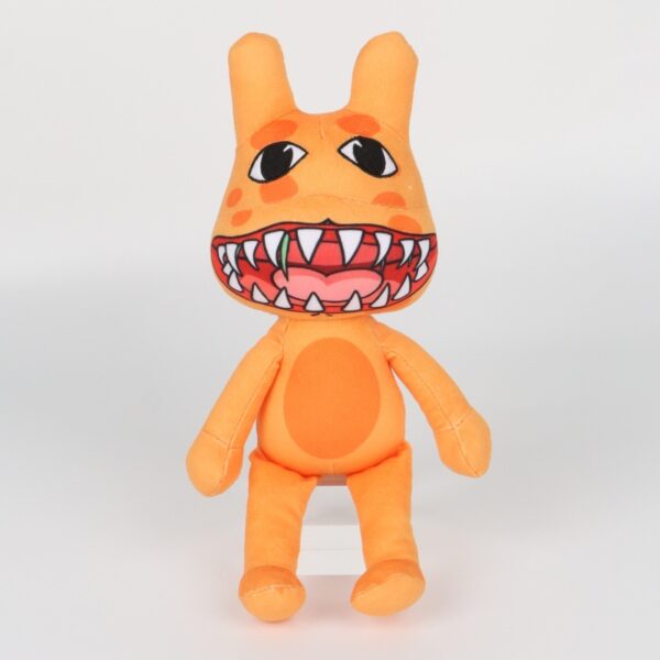 Spotted yellow dog with a wide, baring-teeth grin Plush